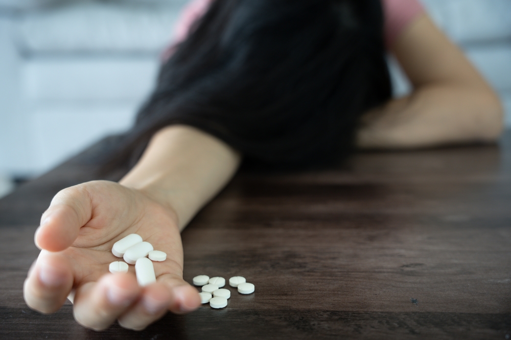 woman use pills overdose, stressed, sad, drug abuser, drug addict,